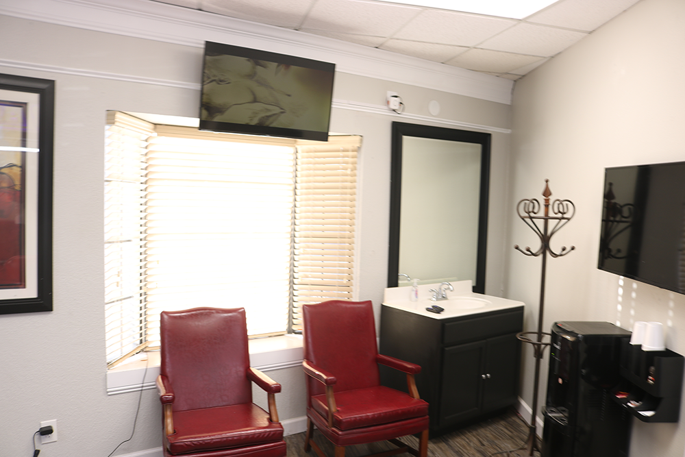 Hair braider suite station at Bladez Barber and Braiding Fort Worth